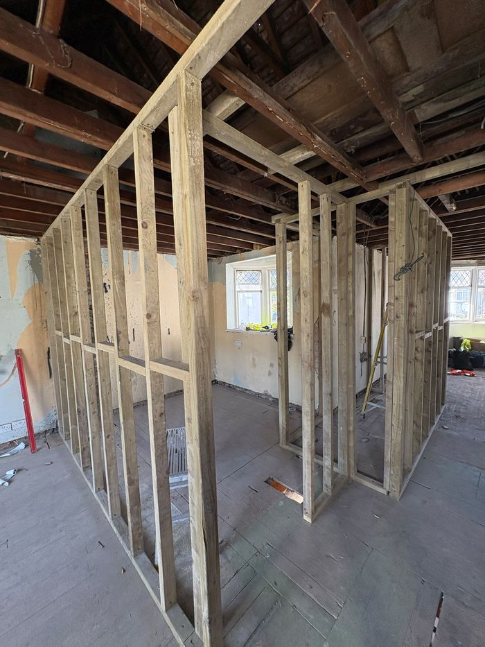 Timber stud partitions setting out new rooms before boarding